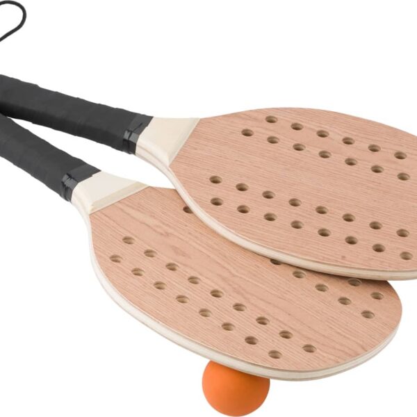 Two wooden beach paddles and an orange ball with black wrist straps.