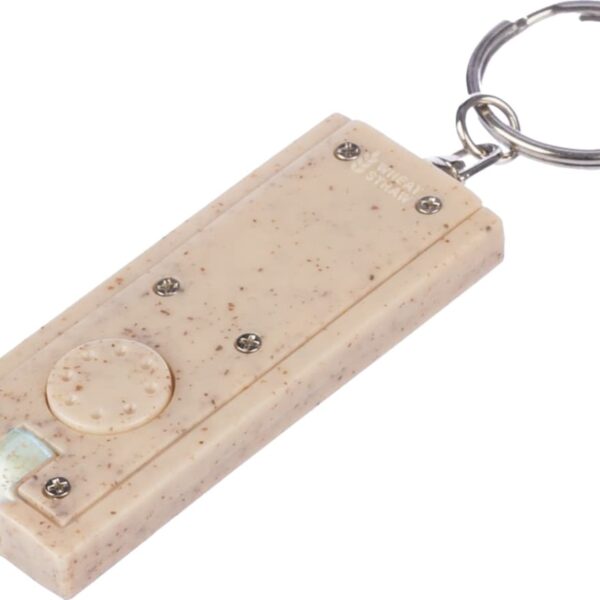 Rectangular beige keychain light with speckled texture and metal key ring.