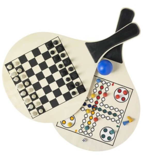 Two paddle-shaped boards are shown. One has a chess/checkerboard with pieces set up, and the other displays a Ludo game with colored pieces. A blue ball and two black-handled paddles are placed nearby.