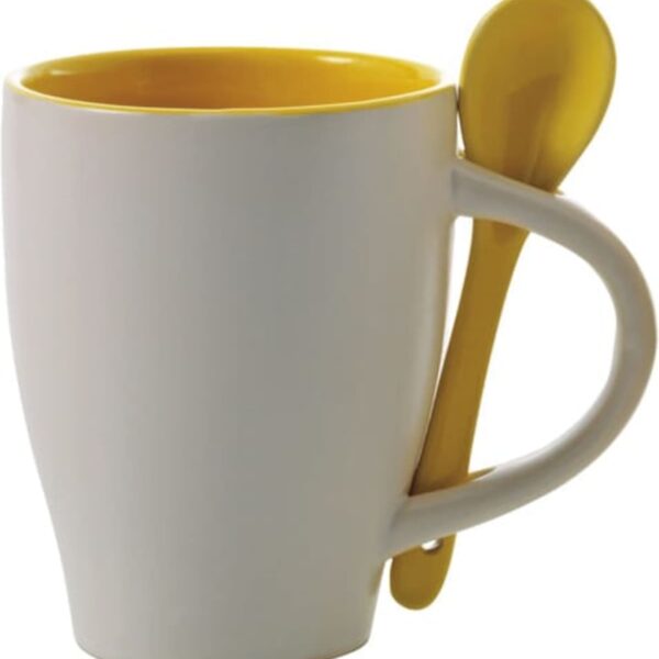 White mug with a yellow interior and a matching yellow spoon inserted in the handle.