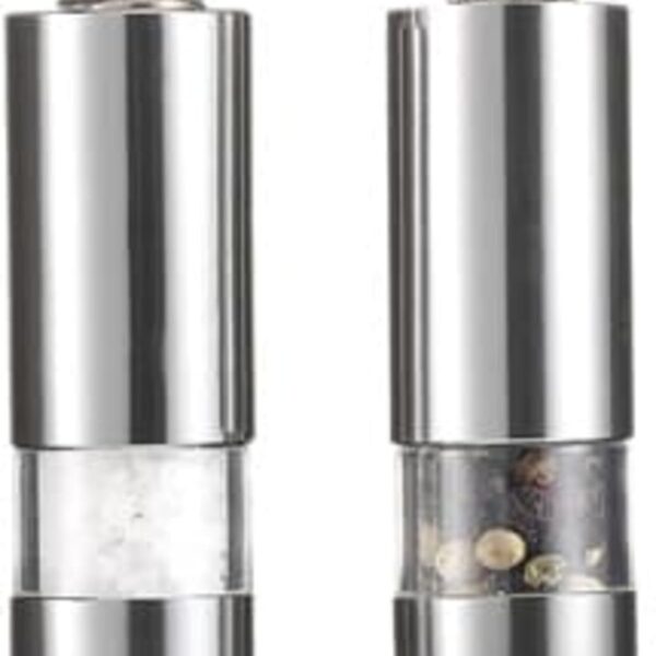 Two silver push-button salt and pepper mills with visible contents.