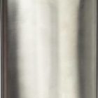 Metallic hip flask with a screw cap on top.