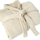 Beige folded bathrobe with a tied belt, soft and plush texture.
