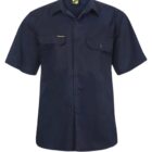 A navy blue short-sleeve button-up shirt with two chest pockets, each having a button closure. The left pocket has a small, embroidered logo. The shirt has a collar and a row of buttons down the front.