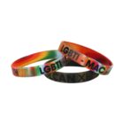 Three colorful wristbands with LGBTI and text inscriptions.