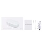 Wireless charging sterilizing box with cables and instructions on a white background.