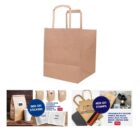 Brown paper bag with handles, stickers, stamps, and personalized options displayed.