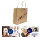Brown shopping bag with SOLDES text and various customizable stamps and stickers displayed.