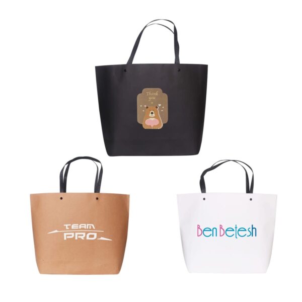 Three tote bags: black with bear, brown with Team Pro, white with Ben Betesh.