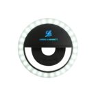 Ring light with Liddel & Barnett logo on a black background.