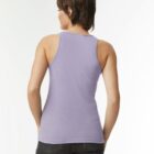 Person wearing a light purple tank top and jeans, facing away.