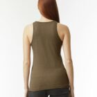 Rear view of a person with long red hair wearing an olive tank top and dark jeans.