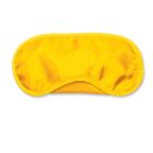 A bright yellow silk sleep mask with a smooth texture and curved edges, designed to cover the eyes for blocking light.