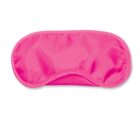 A pink satin sleep mask with a smooth texture and slightly gathered fabric edges, lying flat on a white background.