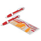 Two red and silver pens placed parallel on a white surface next to a notepad. The notepad has a design with red and orange geometric shapes and the word ARCHVISION in bold letters.