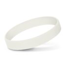 A plain white silicone wristband lying against a white background, casting a soft shadow beneath it.