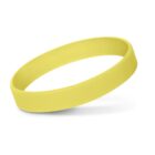 A yellow silicone wristband with a smooth surface. It is slightly curved, casting a shadow on a plain white background.