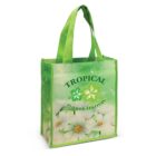 A green reusable tote bag with the words Tropical Flower Festival printed on it. The design includes white and yellow flowers at the bottom, and the bag has two handles.