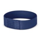 A dark blue, fabric wristband with a rectangular patch, possibly for identification or decoration. The wristband is laid out in a circular shape on a plain white background.