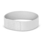A white fabric wristband with a Velcro closure, shown in a looped position against a plain white background.