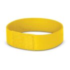 A bright yellow wristband with a simple, smooth texture. It is circular, displaying a Velcro tab for fastening. The band is against a plain white background.