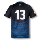 Rear view of a sports jersey with the number 13 printed in white at the center. The jersey is black with blue geometric patterns at the bottom. Logos are visible on the shoulder and back neckline.