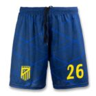 Blue athletic shorts with a yellow number 26 on the right leg and a yellow and blue crest featuring a shield on the left leg. The shorts have an elastic waistband with a black drawstring, and a wavy pattern covering the fabric.
