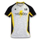 A sports jersey with a gray and white pixelated pattern, black and yellow accents on the sleeves and sides. It features the number 18, a Thunder logo with a lightning bolt, and a small emblem on the right shoulder.