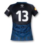 Back view of a black and blue sports jersey with the number 13. It features tribal patterns and logos on the sleeves and upper back. The design is vibrant with a unique style on the lower portion.