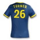 Blue sports jersey with yellow accents and the name Turner above the number 26 on the back.