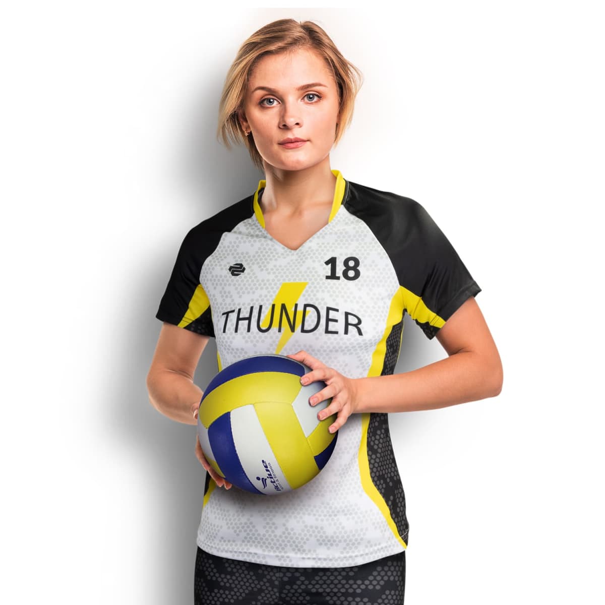 A person with short hair is wearing a black and yellow sports jersey with the number 18 and holding a volleyball. The jersey has Thunder written on it. The background is plain white.