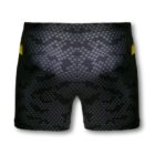 Black and gray patterned athletic shorts with small geometric shapes and yellow accents on the sides, shown from the back.