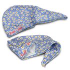 Two blue, floral-patterned scrub caps with white and yellow daisies. One cap is laid out flat, and the other is tilted, showing the inner lining. Both caps have Feelin Fresh embroidered in orange-red script on the side.