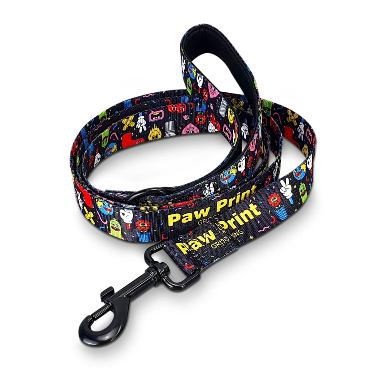 A colorful dog leash with various cartoon graphics featuring a black clasp. The leash has repeated Paw Print text in yellow. The graphics include playful images of animals and objects.