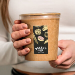 Custom stickers on a brown cup