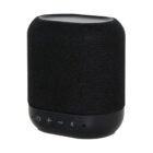 A black portable speaker with control buttons on its base.