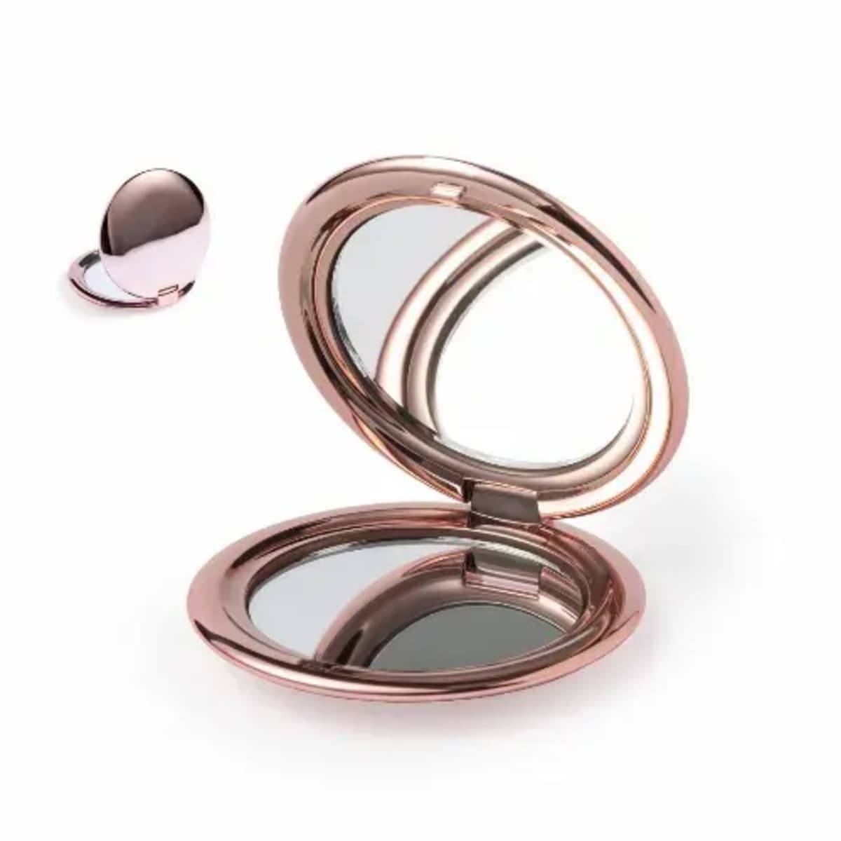 Open rose gold compact mirror with a smaller one in the background.