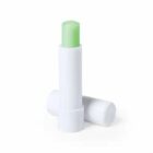 White tube with green lip balm, uncapped, on white background.