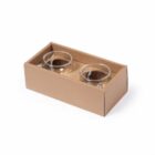 Two glass cups in a brown cardboard box on a white background.
