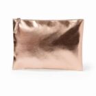 A shiny rose gold zippered pouch on a white background.