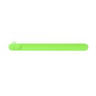 Green silicone slap bracelet on a white background.