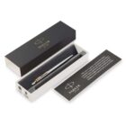 A Parker pen in a gift box with a card beside it on a white background.