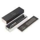 A Parker pen in a black gift box with a card beside it.