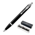 Black ballpoint pen with silver clip, shown with its box and packaging.