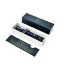 Blue Parker pen in a gift box with an information card beside the box on a white background.