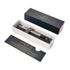 A Parker pen in a gift box with a card displaying the Parker IM branding and description.