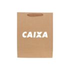 Brown paper bag with CAIXA in white letters.