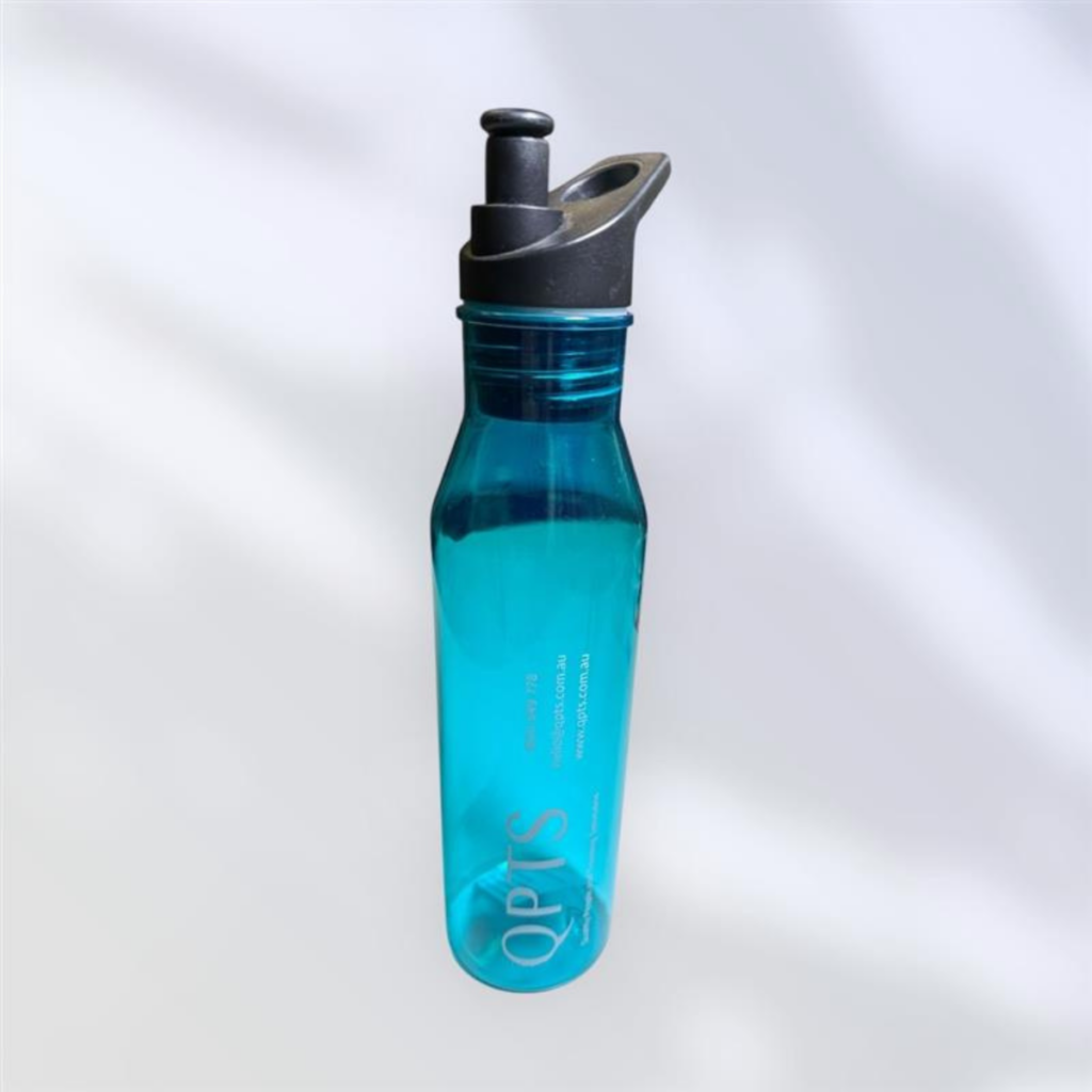 This promotional bottle is a tall, translucent blue with a dark gray flip-top lid and spout. The stylish design features QPTS printed vertically in white on its side.