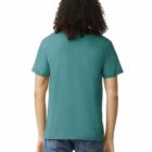 Person with curly hair wearing a teal t-shirt and jeans, shown from the back.
