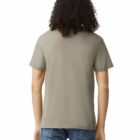Person with curly hair wearing a plain gray t-shirt and blue jeans, shown from the back.